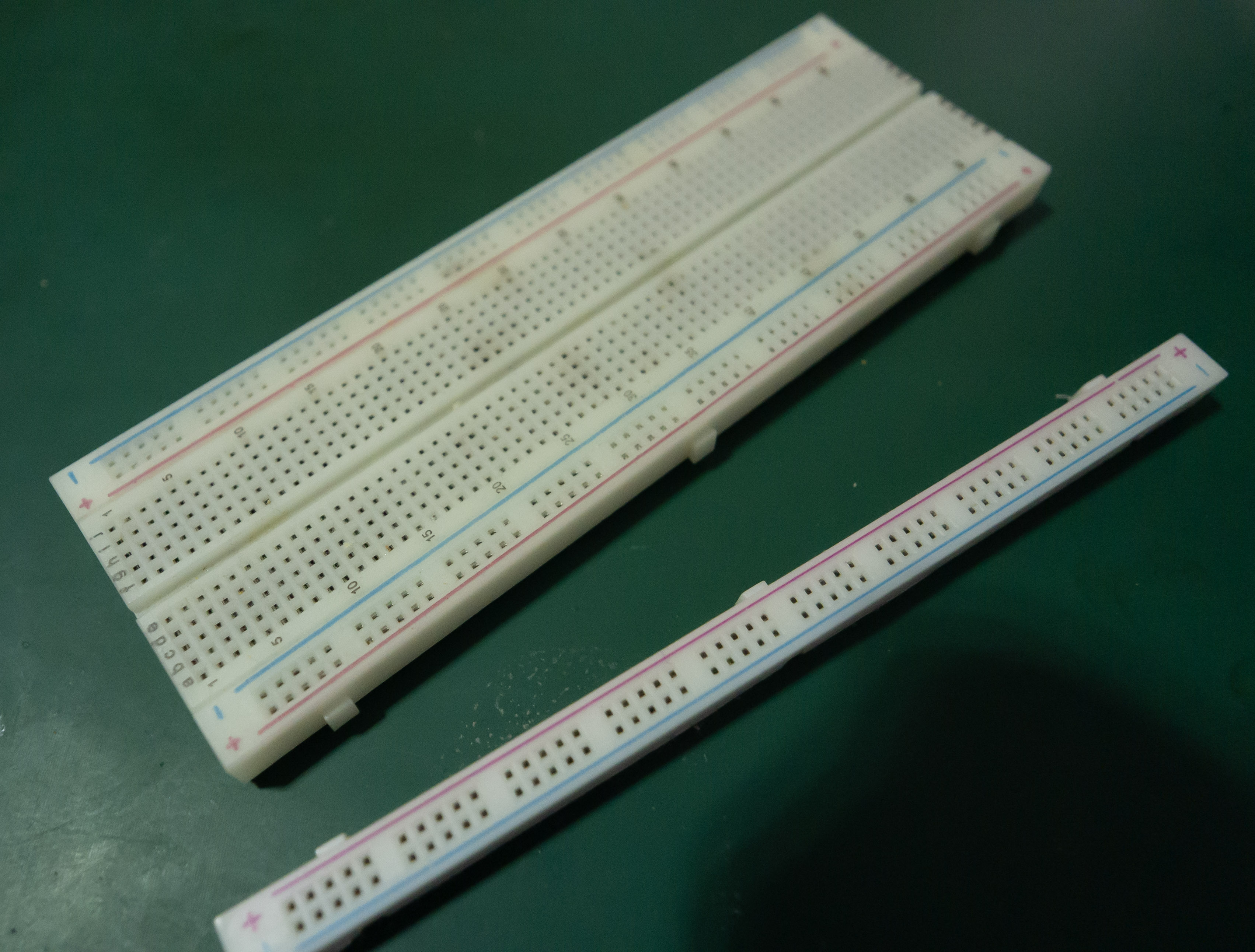 Breadboard with detachable rails